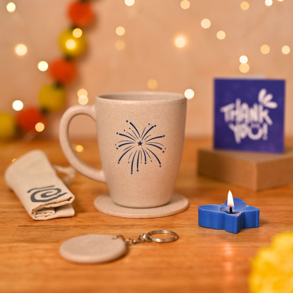 Eha Earth Friendly Diwali Gift Hampers | Cracker Printed Mug, Coaster, Key Chain, Candle, Gift Bag, Card