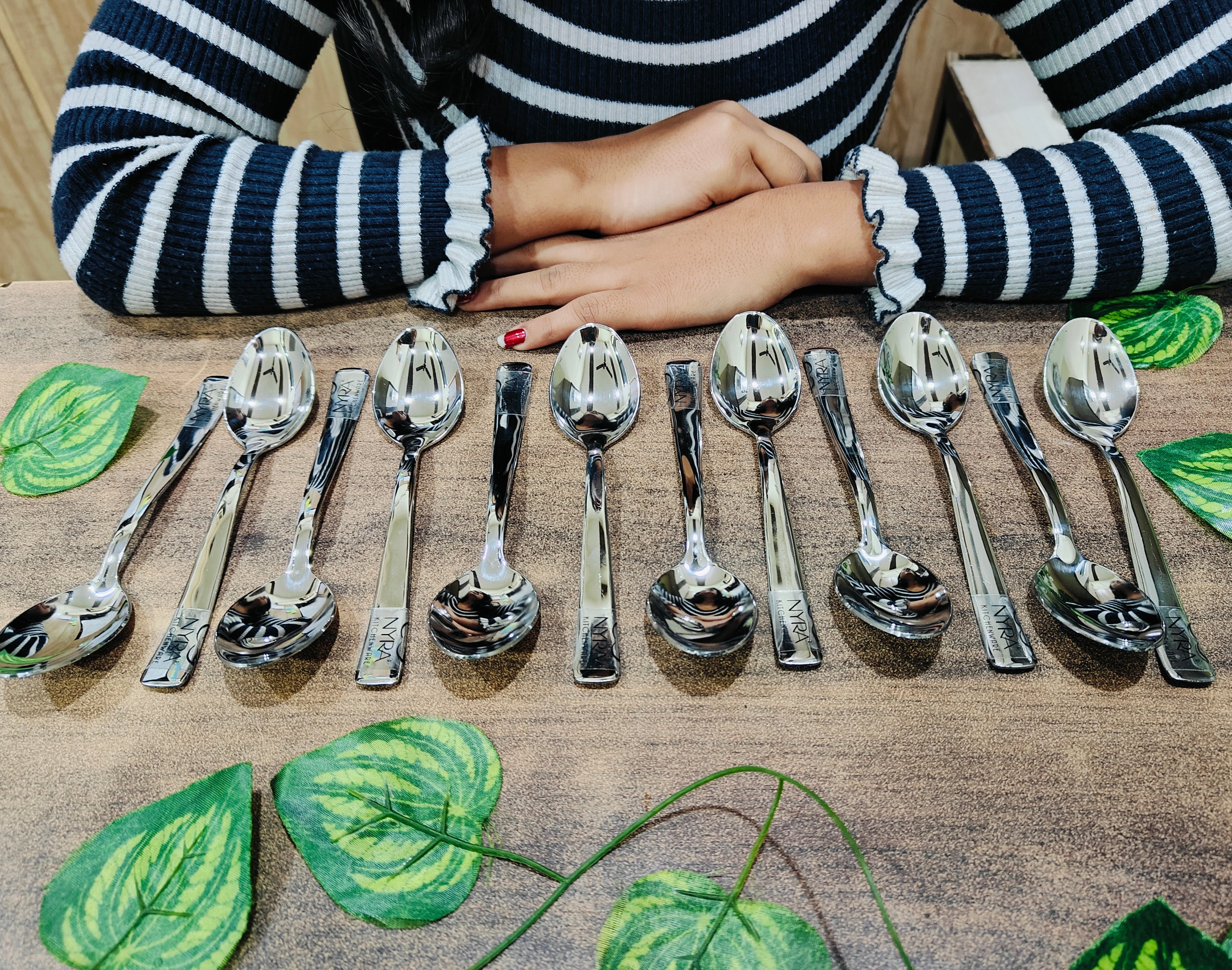 Stainless Steel Set of 12 Spoons on the table