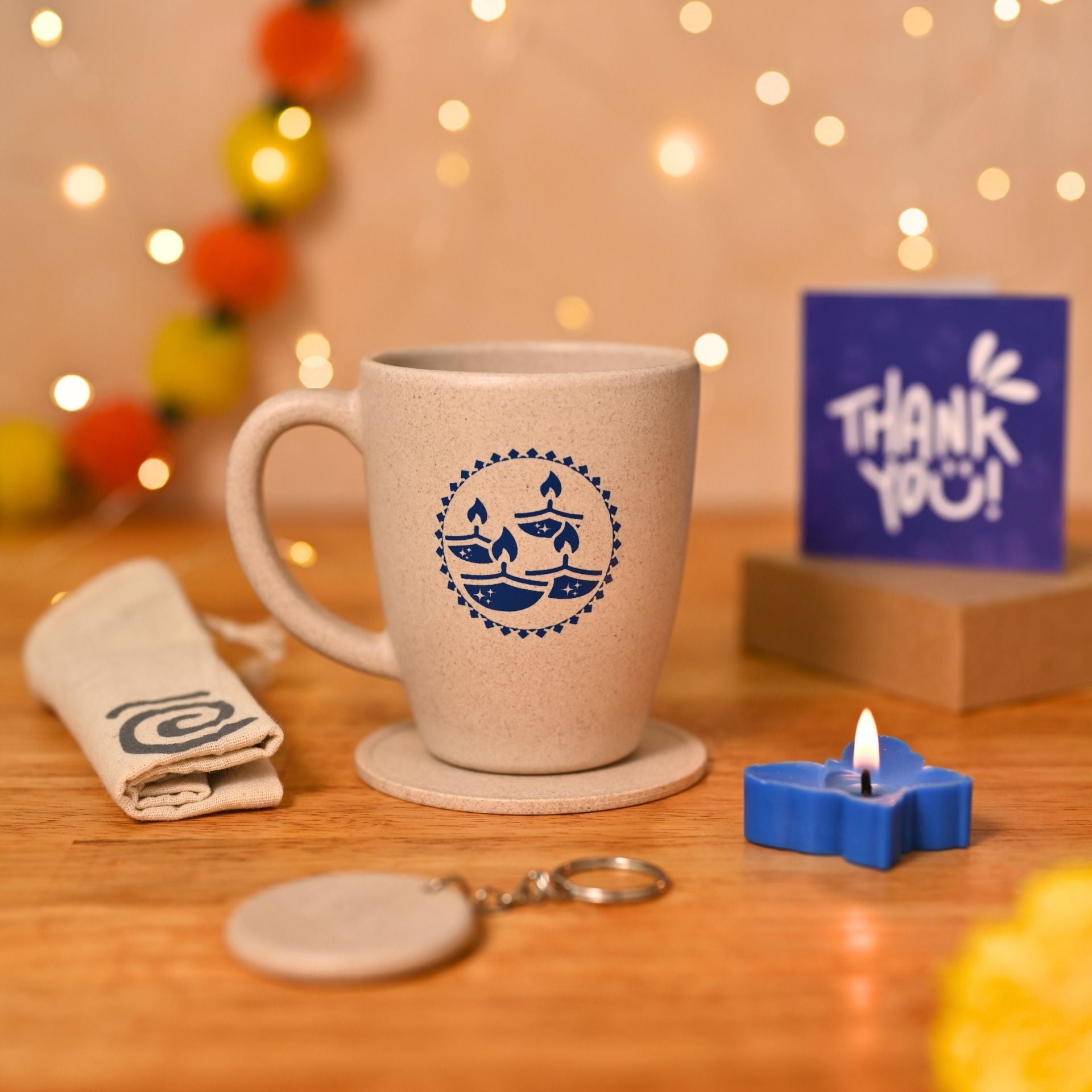 Eha Earth Friendly Diwali Gift Hampers | Diya Printed Mug, Coaster, Key Chain, Candle, Gift Bag, Card
