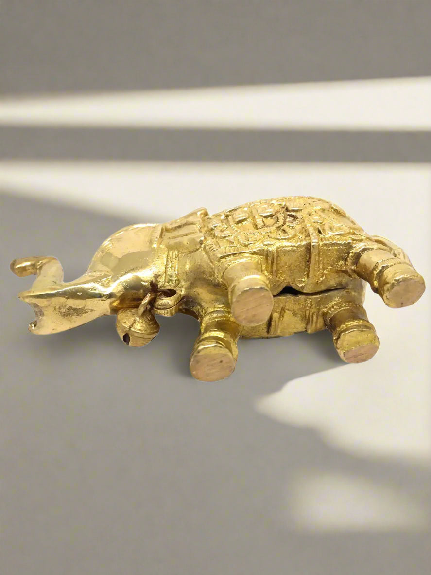 side view of Handcrafted Pure Brass Elephant Figurine with Bell 