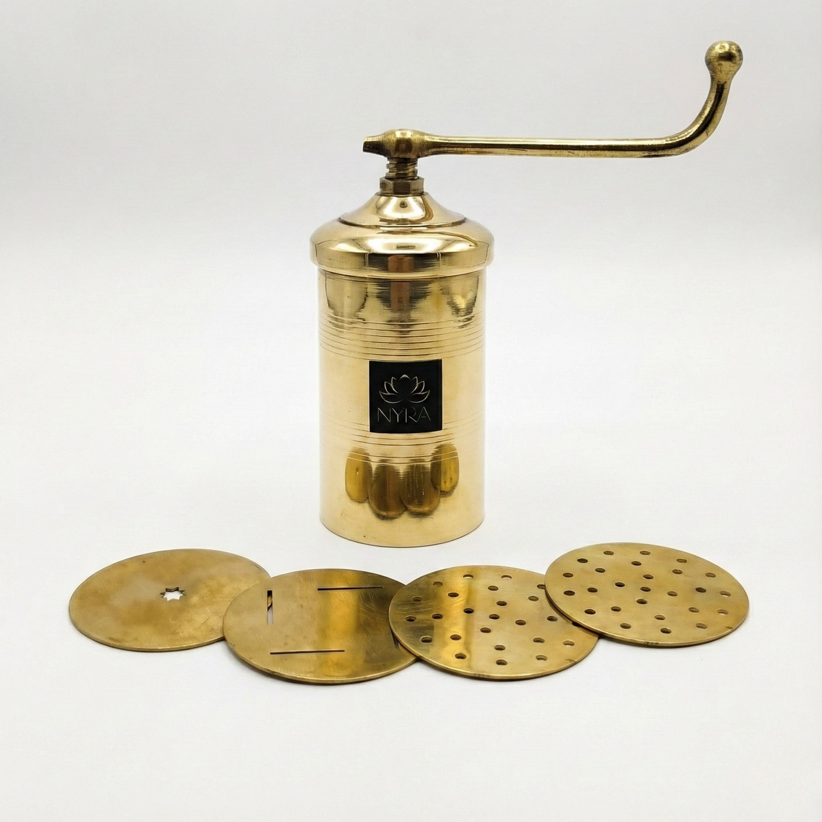 Brass lamp with adjustable shades on a white background
