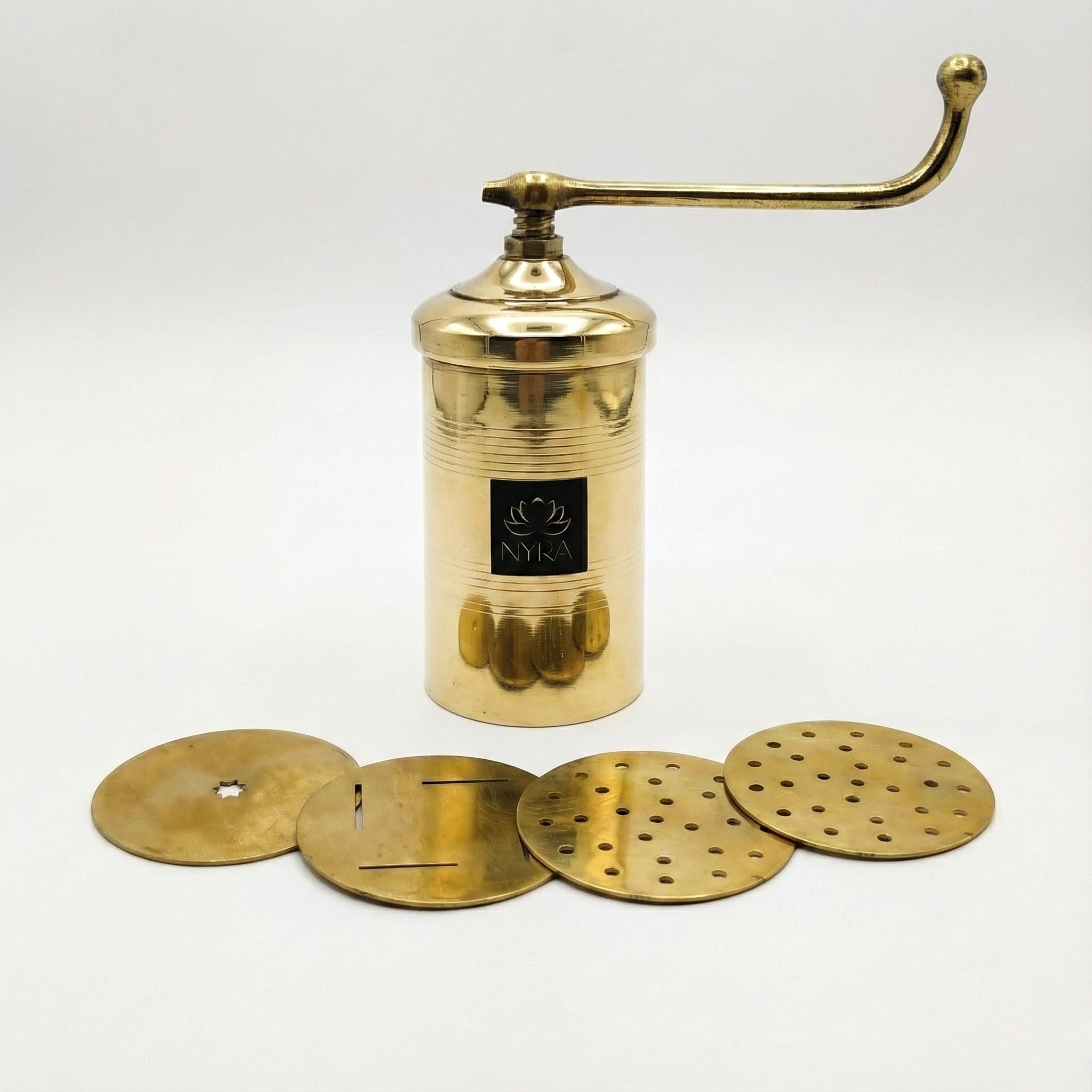 Brass lamp with adjustable shades on a white background