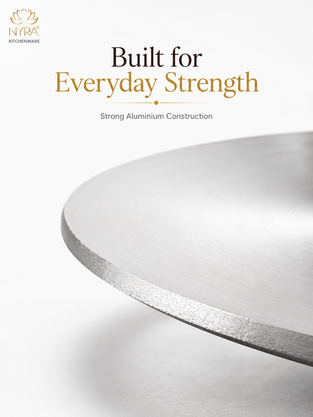 A close-up promotional product photo of a brushed silver aluminium round tray or plate edge on a clean white background, with the text 'Built for Everyday Strength' and 'Strong Aluminium Construction' plus the NYRA KITCHENWARE logo in the upper left.