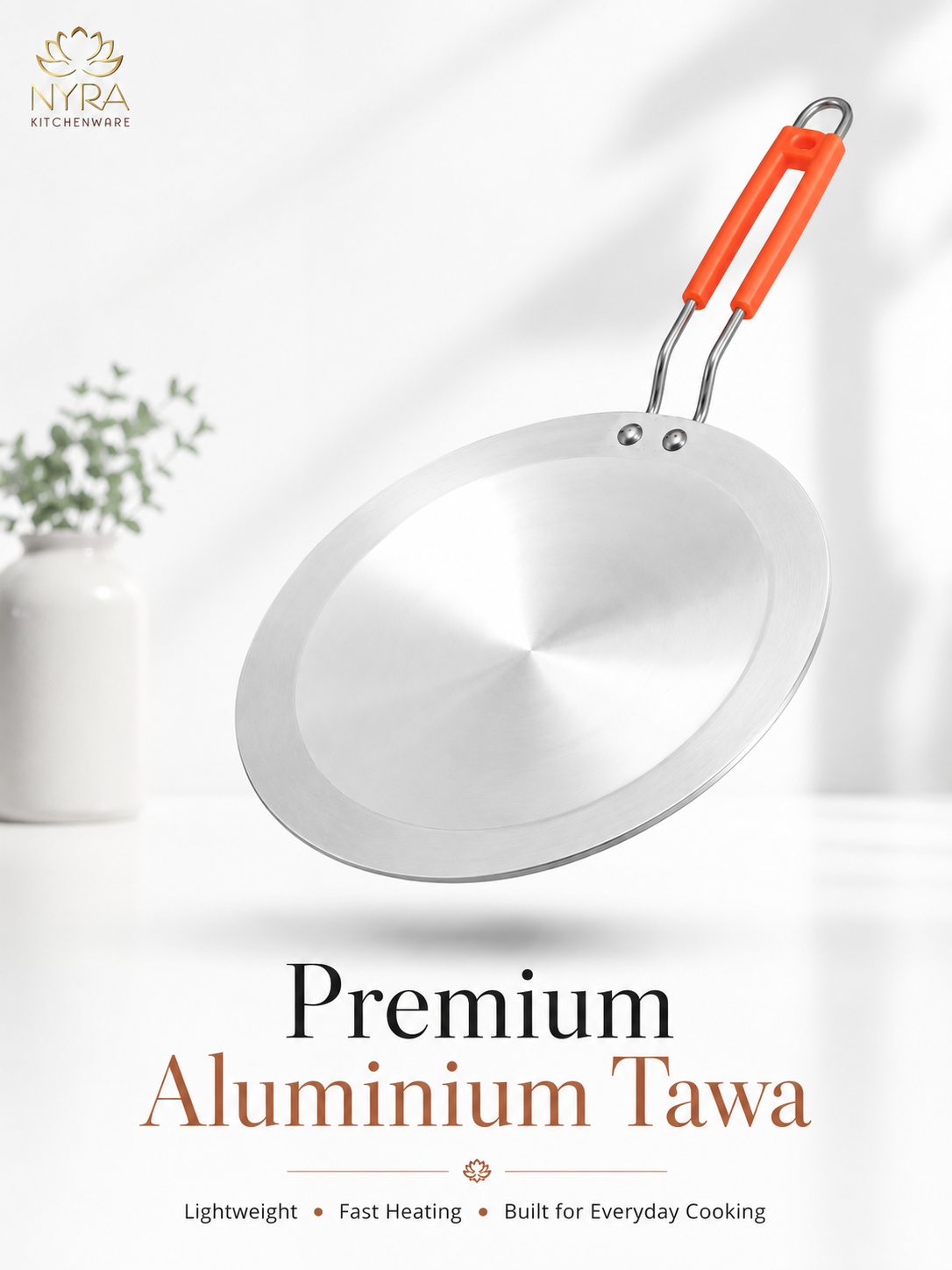 A premium stainless steel tawa pan with a bright orange handle, shown floating against a clean white background with a blurred vase of greenery. The brand logo 'Nyra Kitchenware' is visible in the top left, and the text 'Premium Aluminium Tawa' is displayed at the bottom.