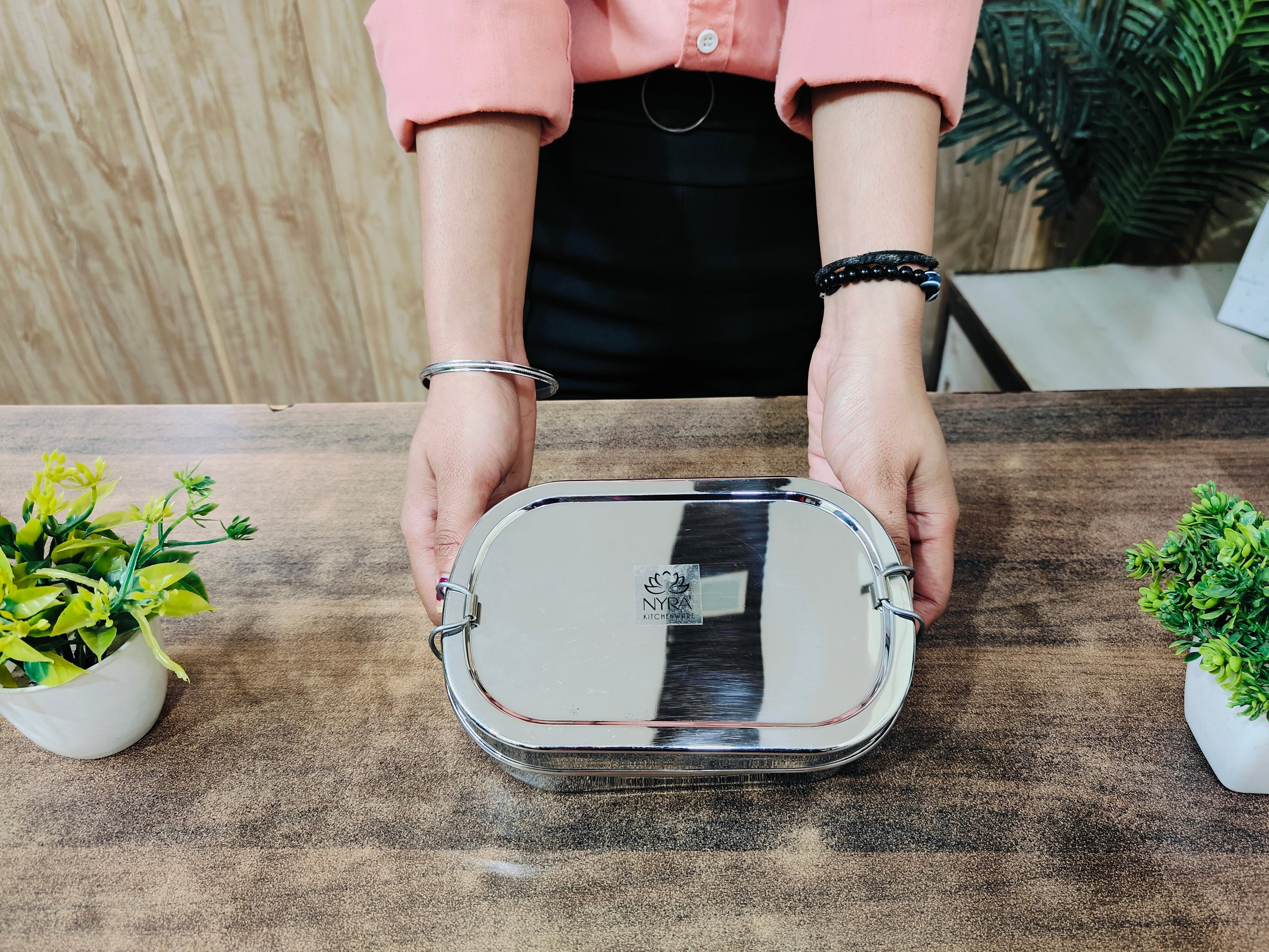 showing in hand Stainless Steel Rectangle Lunch Box