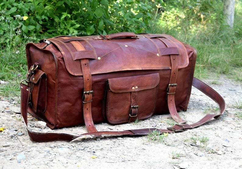 black leather duffle bag