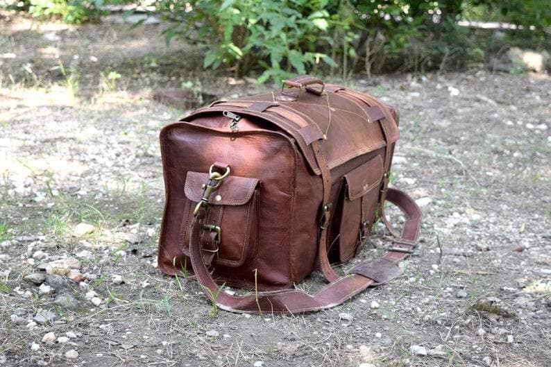 black leather duffle bag