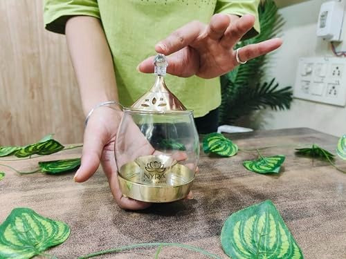 Showing Brass Traditional Diya Stand with Clear Fiberglass Cover